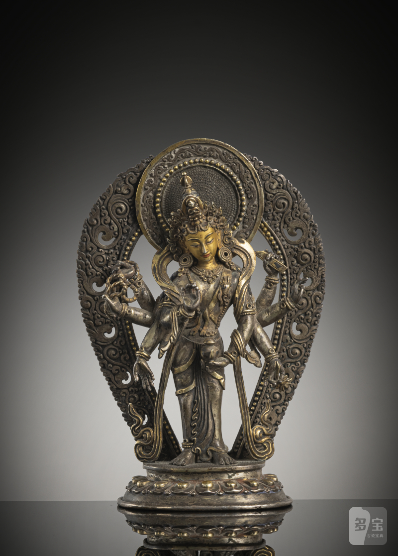 Partially fire-gilded silver figure of Amoghapasha